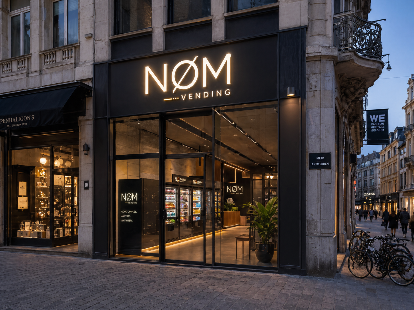 NØM vending micro-market integrated into a premium city shopping street storefront.